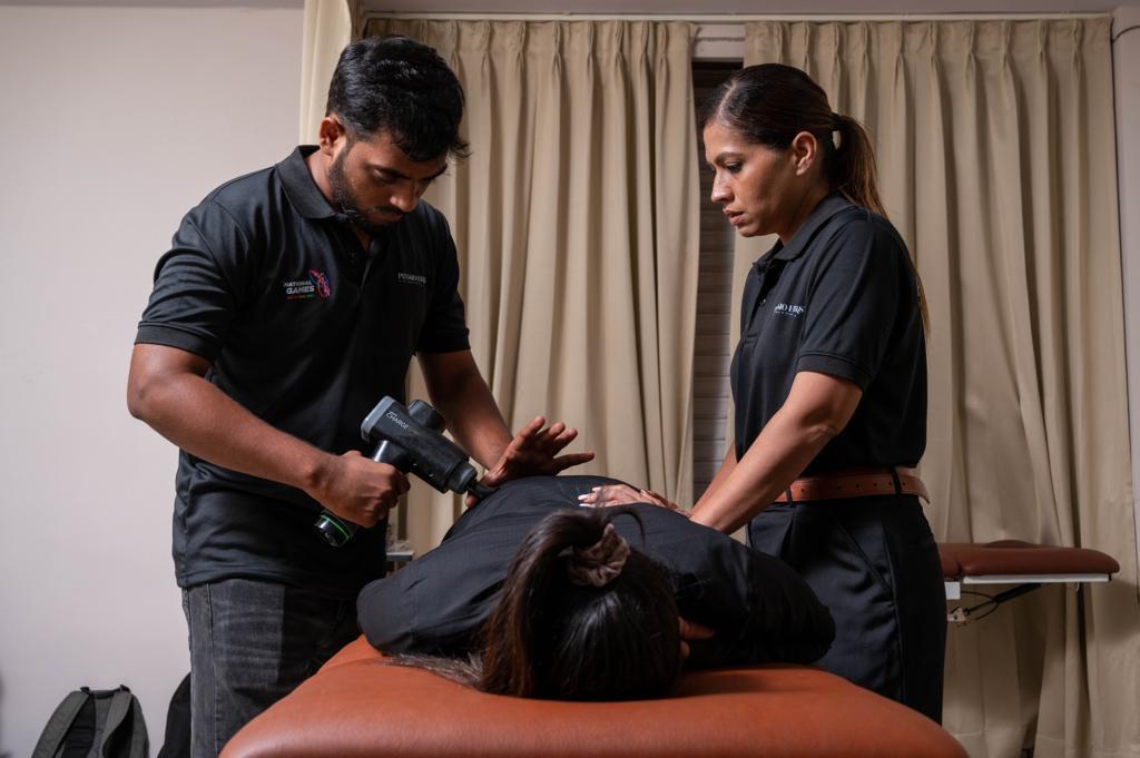 Percussive myofascial therapy session