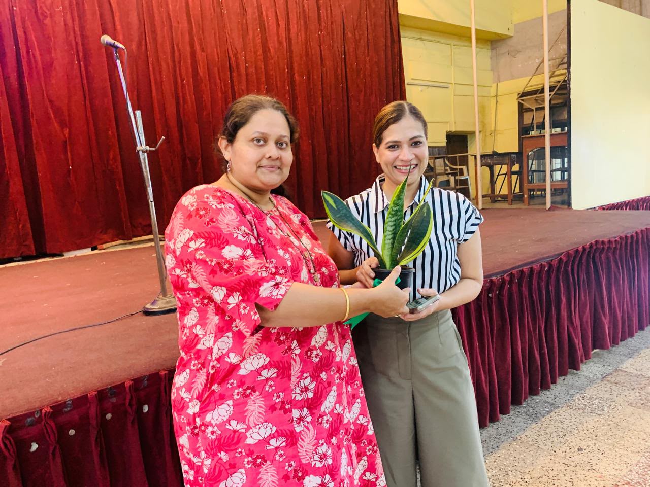 Award presentation to Dr. Verna D'Silva
